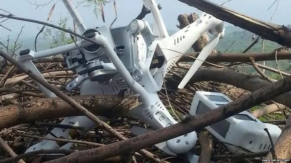 Pakistan shoots down Indian drone near naval base in the city of Lahore, officials say