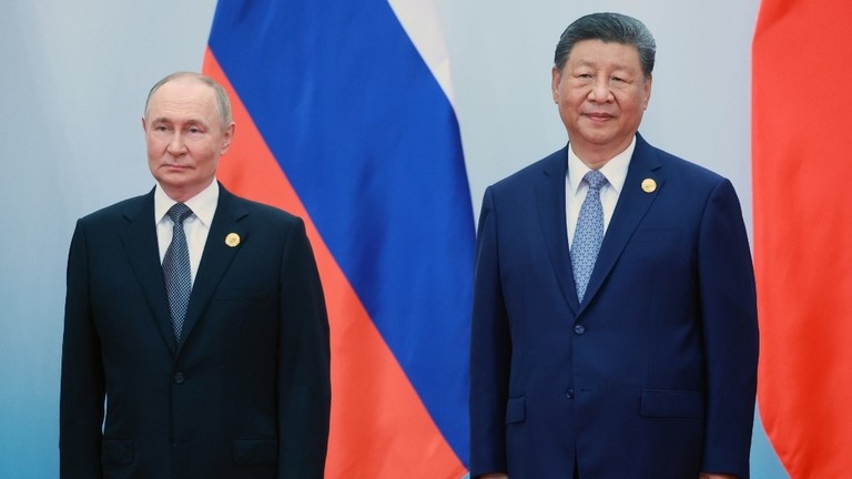 Xi, Putin hold talks in Beijing